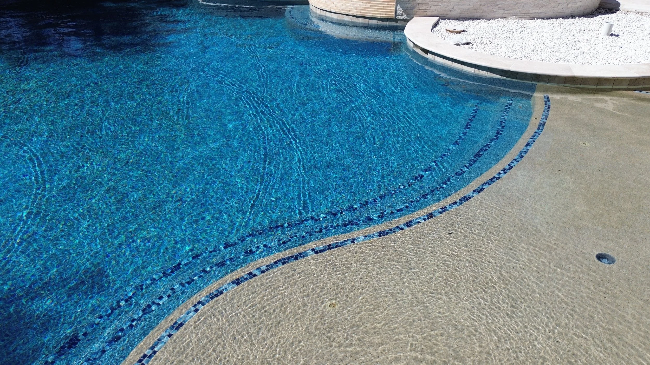 The Importance of Brushing Your PebbleTec Pool Finish