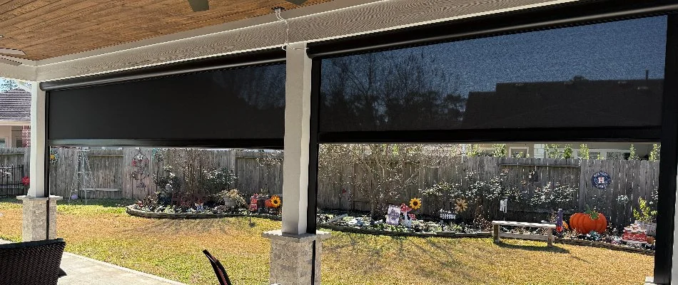 Motorized screen around a patio in Kingwood, TX.