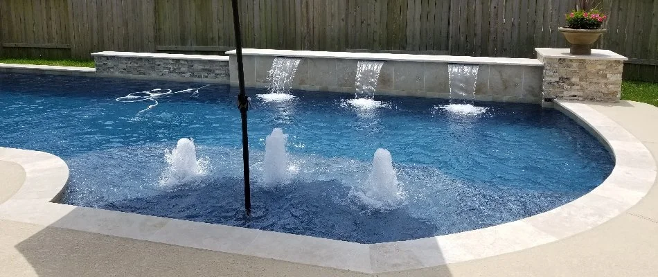 Pool in Klein, TX, with waterfall and bubblers.