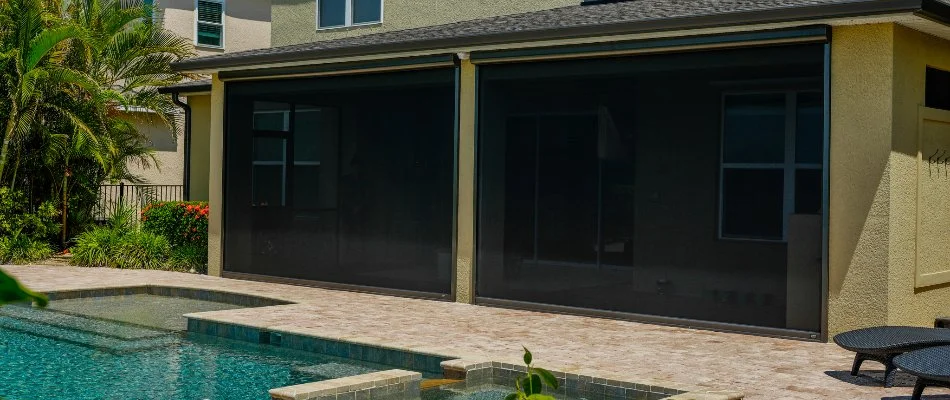 Screened-in patio in Kingwood, TX, with a pool.
