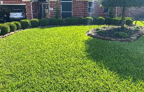 Luxury fire pit installed with patio and landscaping near Leawood, KS.