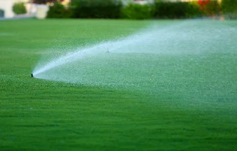 Luxury fire pit installed with patio and landscaping near Leawood, KS.