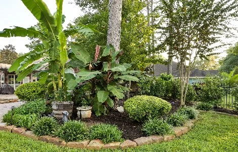 Luxury fire pit installed with patio and landscaping near Leawood, KS.